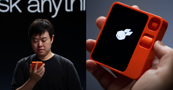 Jesse Lyu holds a small, bright orange object, similar to a smartphone, and speaks into it like a walkie talkie.